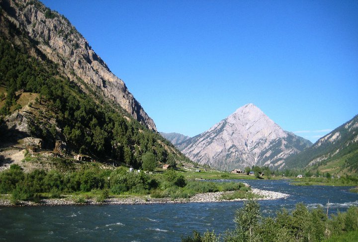 River flowing through a green valley in Gurez
