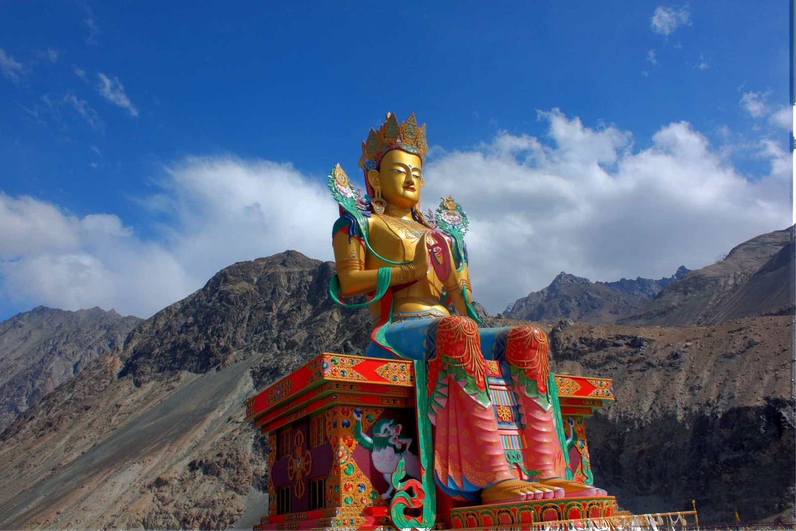Large colorful statue of Maitreya Buddha at diskit monastery
