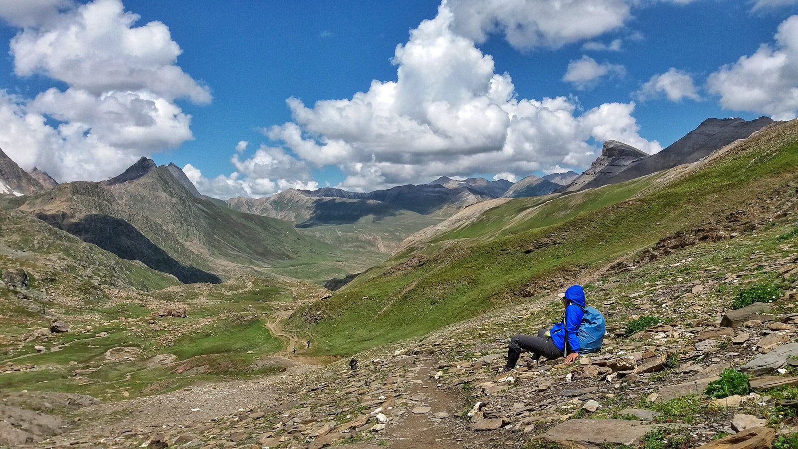 a trekkers resting on the meadows of KGL