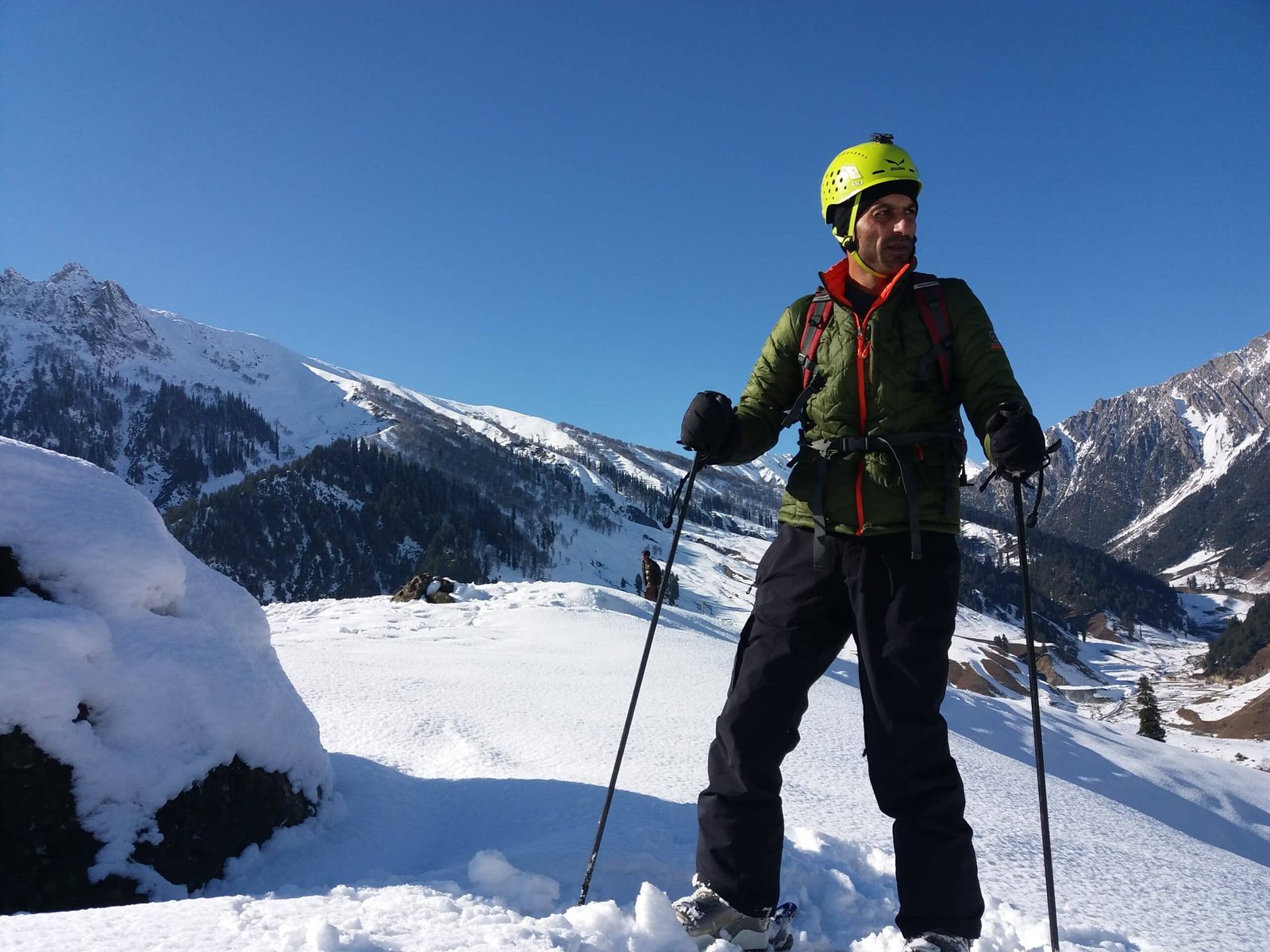 Man doing snow trekking in gulmarg during march
