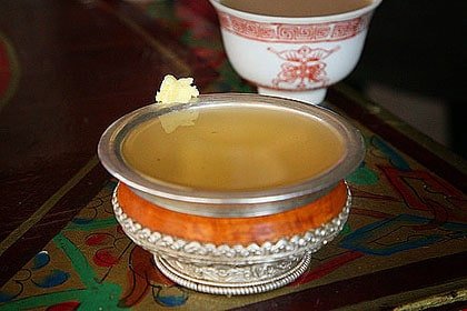 Traditional Ladakhi barley beer in a decorative bowl of chang