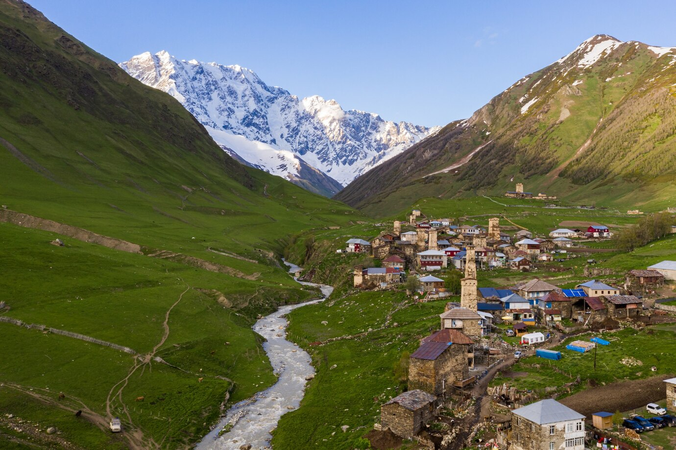 Scenic view of Uleytokpo village with snow-capped mountains in Sham valley